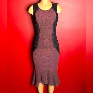 2 piece skirt set with faux leather and lace detail. Size small.